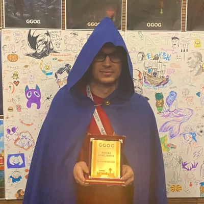 Enes Baytekin Holding His Award