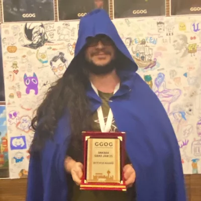Furkan Baytekin Holding His Award
